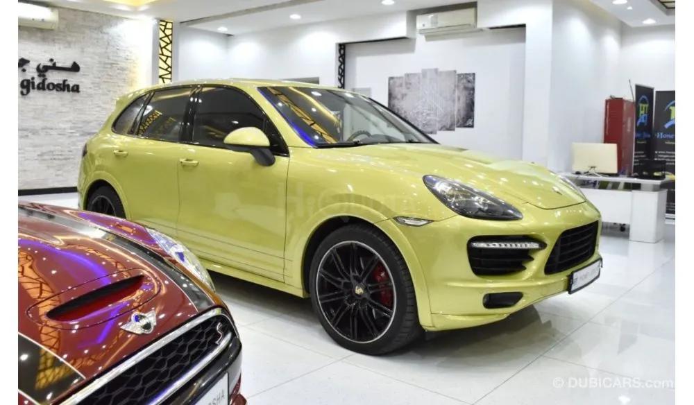 Porsche Cayenne GTS EXCELLENT DEAL for our Porsche Cayenne GTS ( 2013 Model ) in Green Color GCC Specs