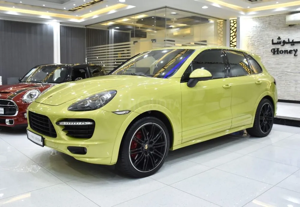 Porsche Cayenne GTS EXCELLENT DEAL for our Porsche Cayenne GTS ( 2013 Model ) in Green Color GCC Specs